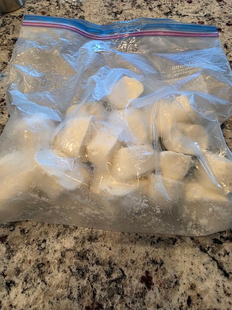 a bag of frozen cubes of garlic butter